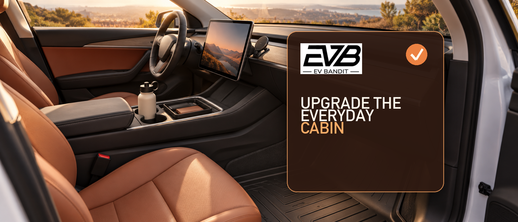 EV Bandit guide to practical Model Y cabin upgrades including floor liners, screen protection, phone mounting, and console storage