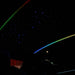 Starlight sunshade with multicolor rainbow ambient lighting at night