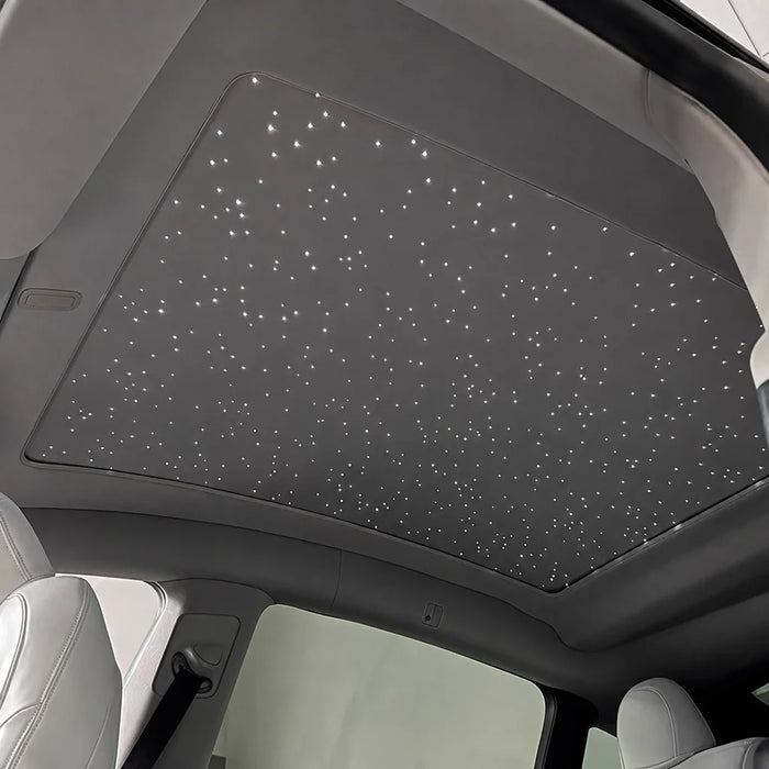 Cybertruck starlight sunroof sunshade with fiber optic stars lit at night