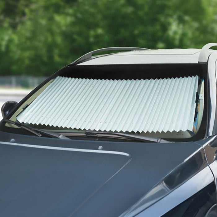 Manual retractable windshield sunshade extended