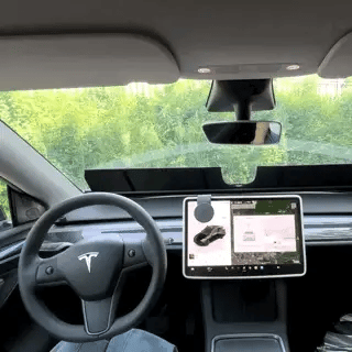 Powered automatic windshield sunshade control