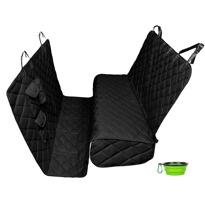 A black, quilted dog seat cover with a step-down design, displayed in a folded configuration, alongside a small green bucket for scale.